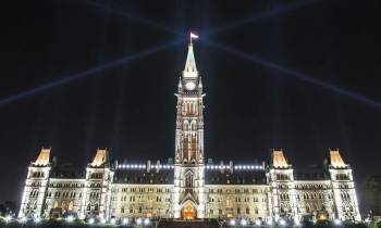 a clock tower lit up at night