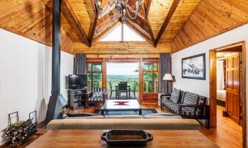 a room filled with furniture and a fireplace