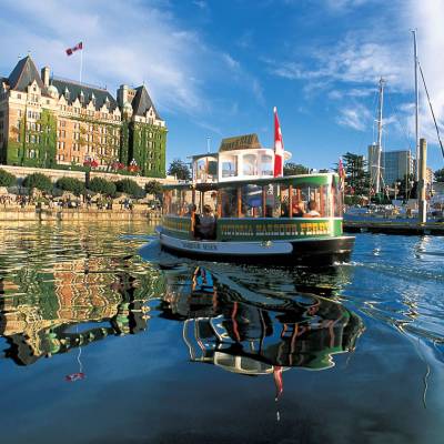 a boat is docked next to a body of water
