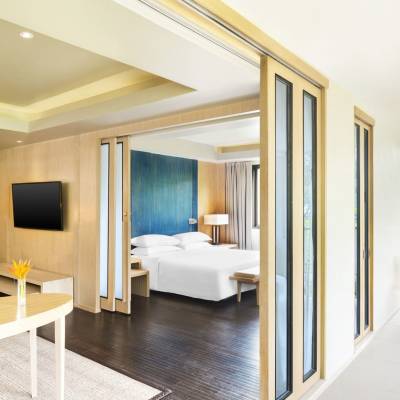 a room filled with furniture and a large window