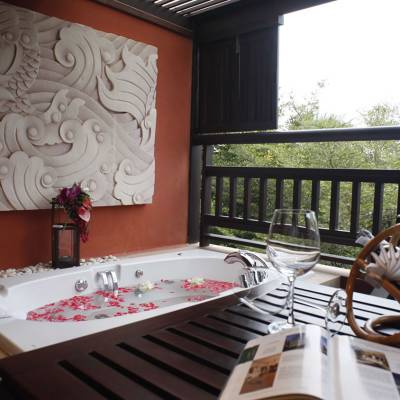 a dining room table in front of a window