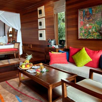 a living room filled with furniture and a fireplace