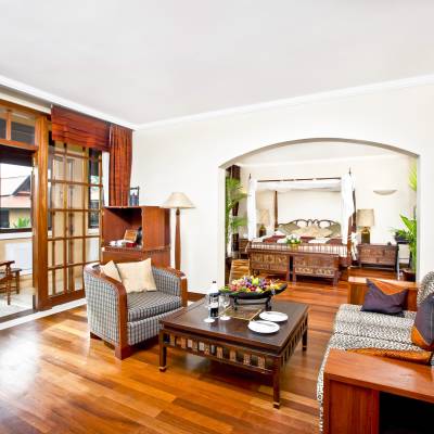 a living room filled with furniture and a large window