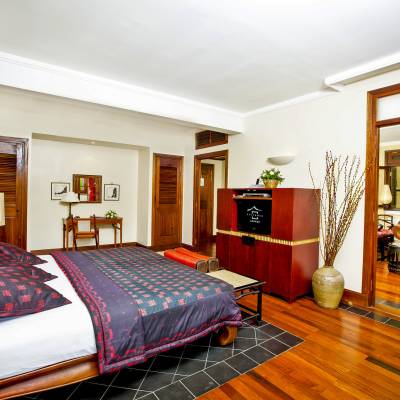a bedroom with a bed in a room