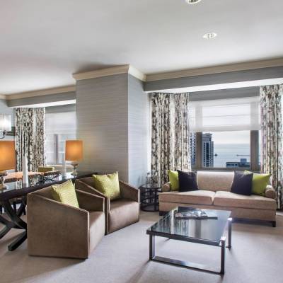 a living room filled with furniture and a large window