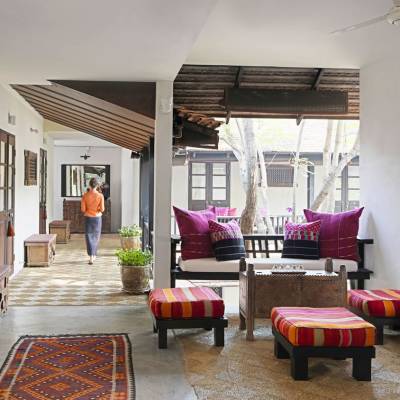 a living room filled with furniture and a fireplace