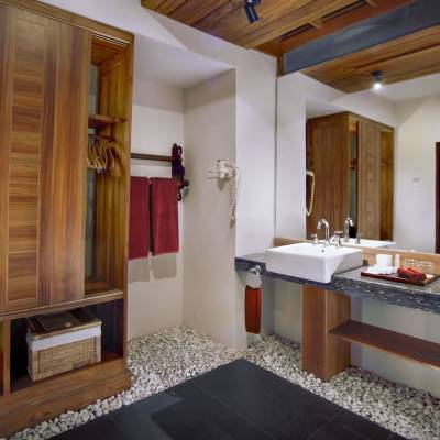 a kitchen with a sink and a mirror