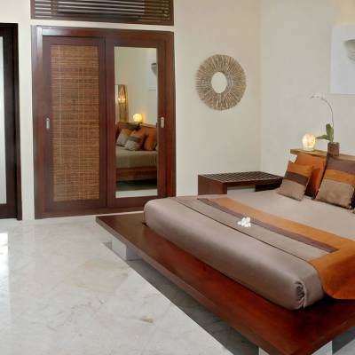 a living room with a large mirror