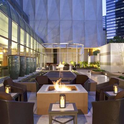 a dining room table in front of a building