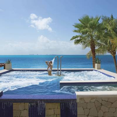 a pool next to a body of water