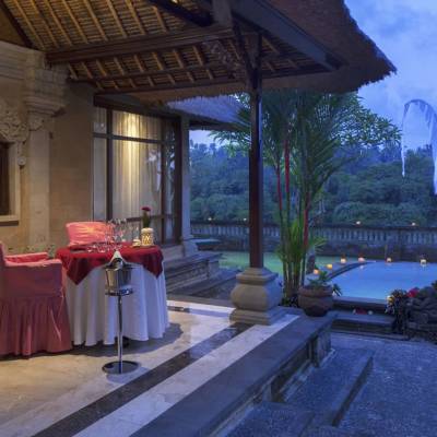 a bedroom with a bed and a fireplace