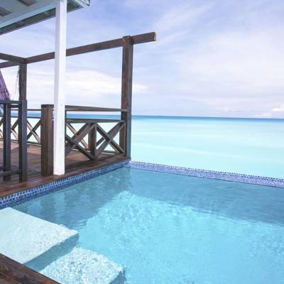 a pool next to a body of water