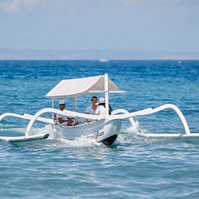 a small boat in a body of water