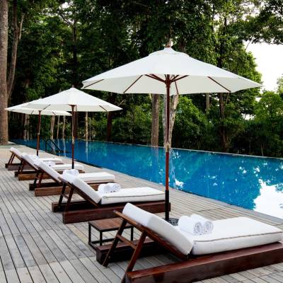a table topped with a blue umbrella