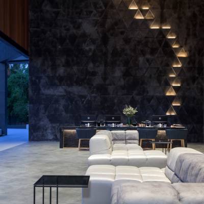 a living area with a building in the background