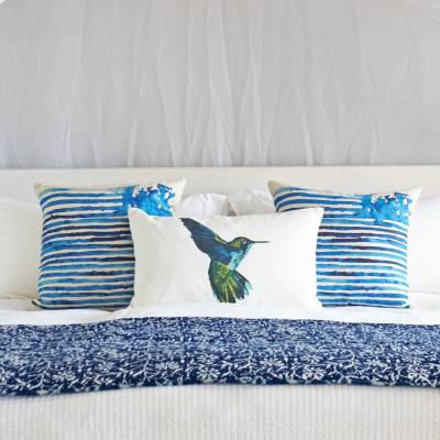 a large white bed in a room