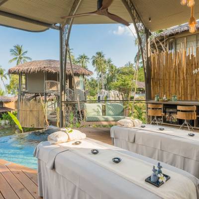 a bedroom with a large pool