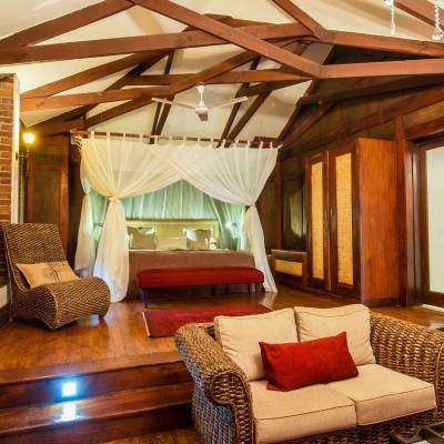 a room filled with furniture and a fireplace