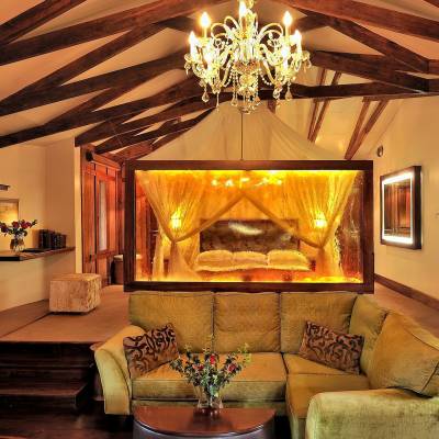 a living room filled with furniture and a fire place