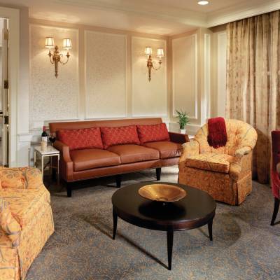 a living room filled with furniture and a large window
