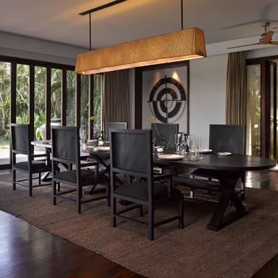 a dining room table in front of a window
