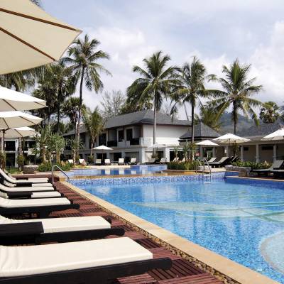 a pool next to an umbrella