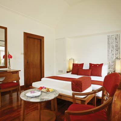 a large red chair in a room