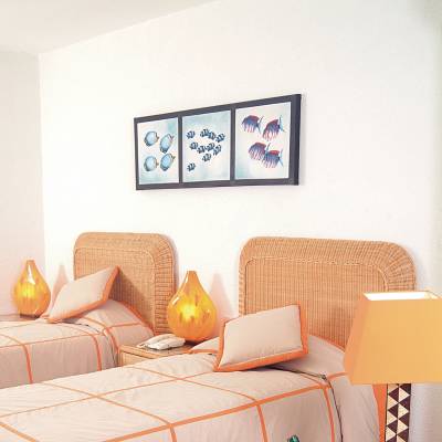 a living room filled with furniture and a lamp