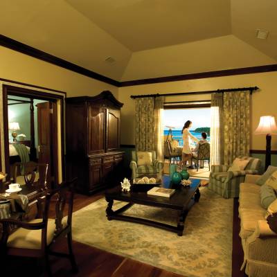 a living room filled with furniture and a fireplace