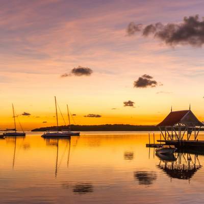 a sunset over a body of water