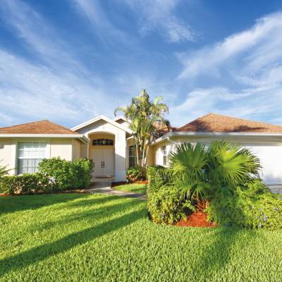 a large lawn in front of a house