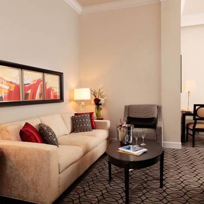 a living room filled with furniture and a flat screen tv