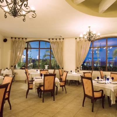 a room filled with furniture and a dining table