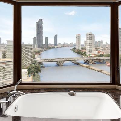 a view of a large mirror next to a window