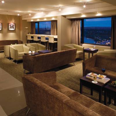 a hotel room with a large mirror