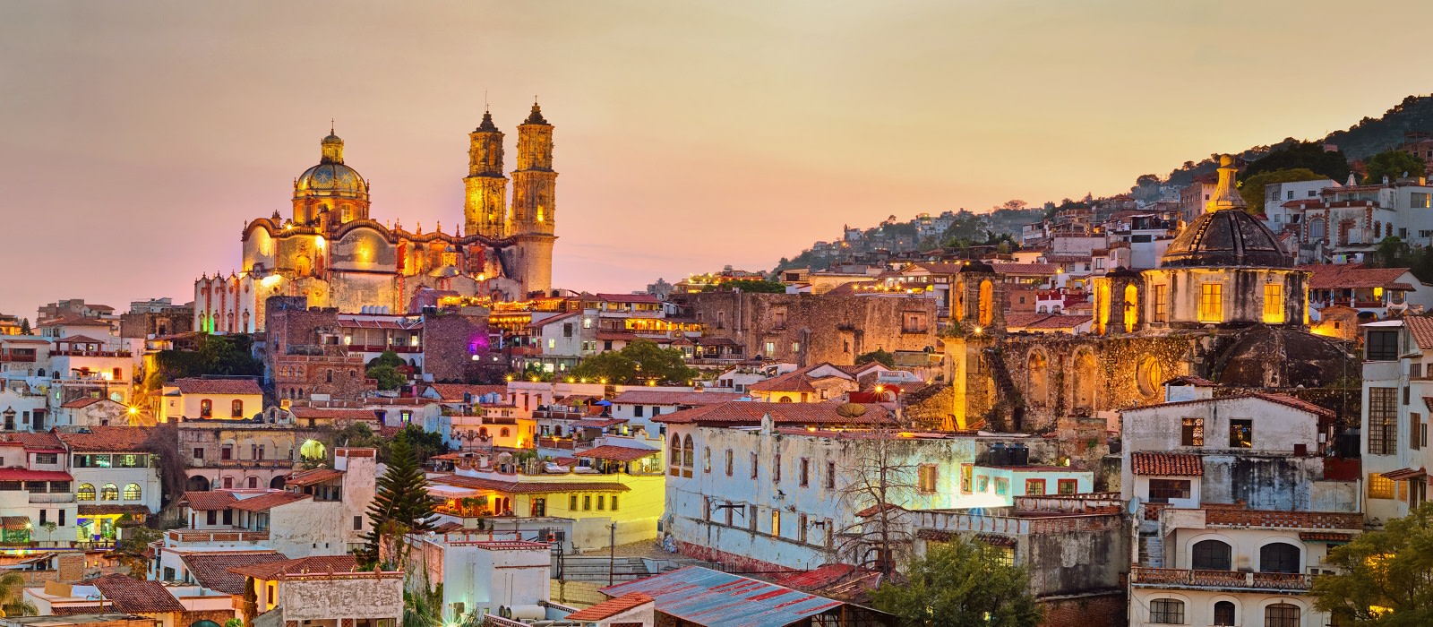 Enchanting Travels Mexico Tours Panorama of Taxco city at sunset in Mexico Enchanting Travels Mexico Tours Panorama of Taxco city at sunset in Mexico - things to do in Mexico - Mexico holiday