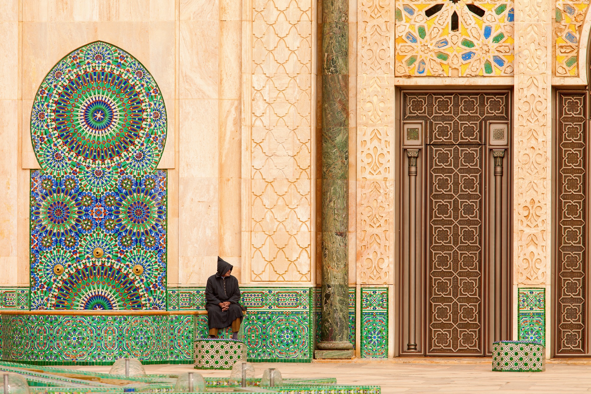 Casablanca, Morocco Ornate exterior brass door of Hassan II Mosque in Casablanca, Morocco shutterstock_186672149