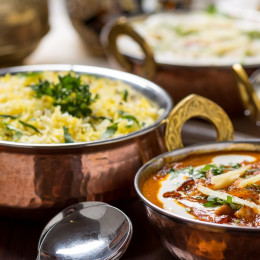 Cuisine of North India Enchanting Travels Indian Food in brass bowl - Indian Restaurant Guide - India travel guide