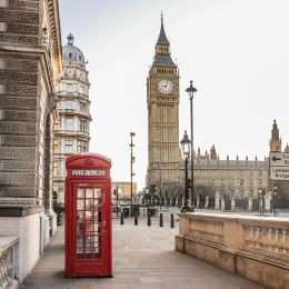Enchanting Travels UK Ireland Tours London Big Ben tower and a red phone booth Telephone box empty streets