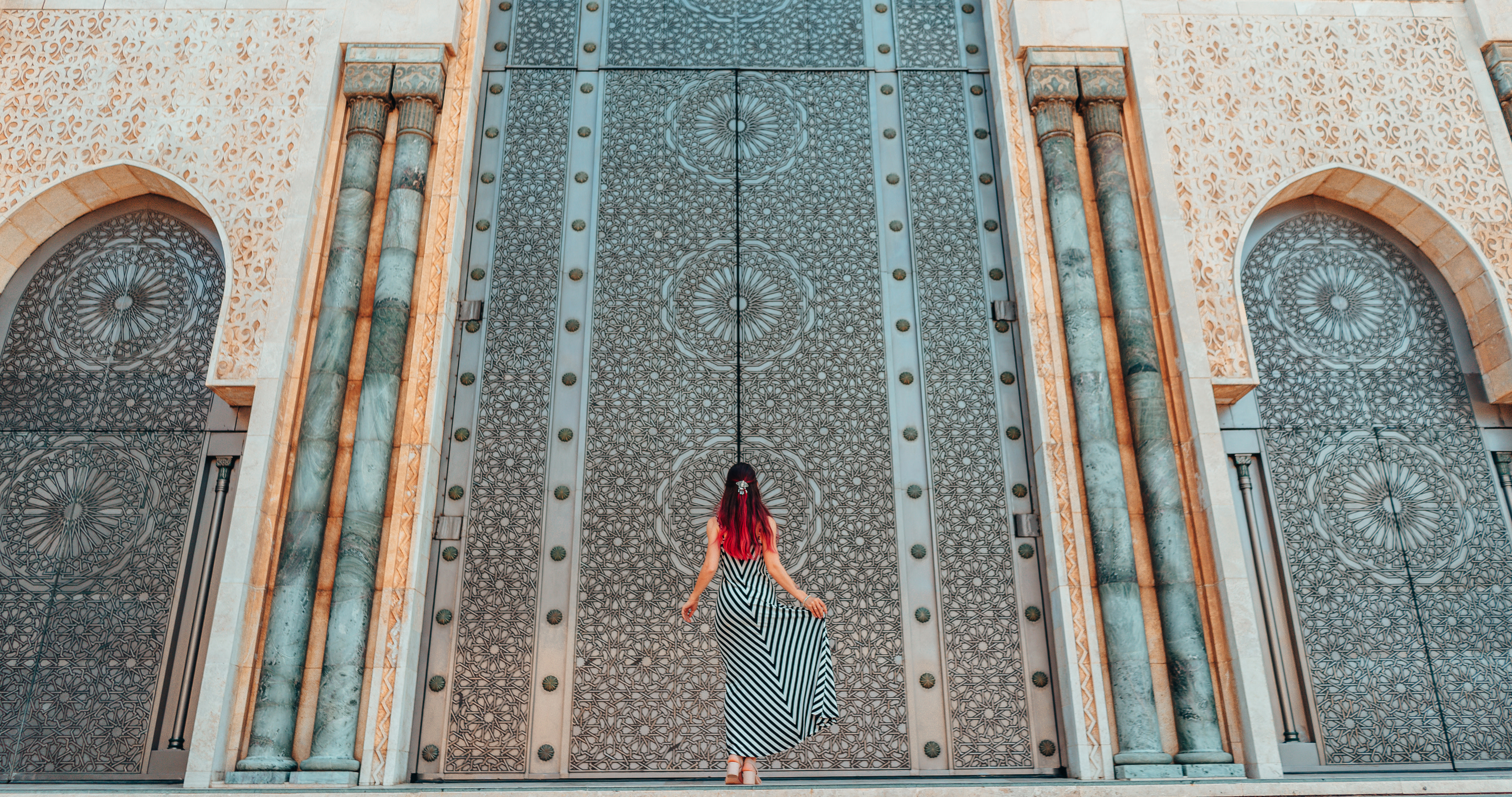 Enchanting-Travels-Africa-Morocco-11 Morocco travel guide - Girls standing in front of greatest mosque Hasan II in Morocco, Africa