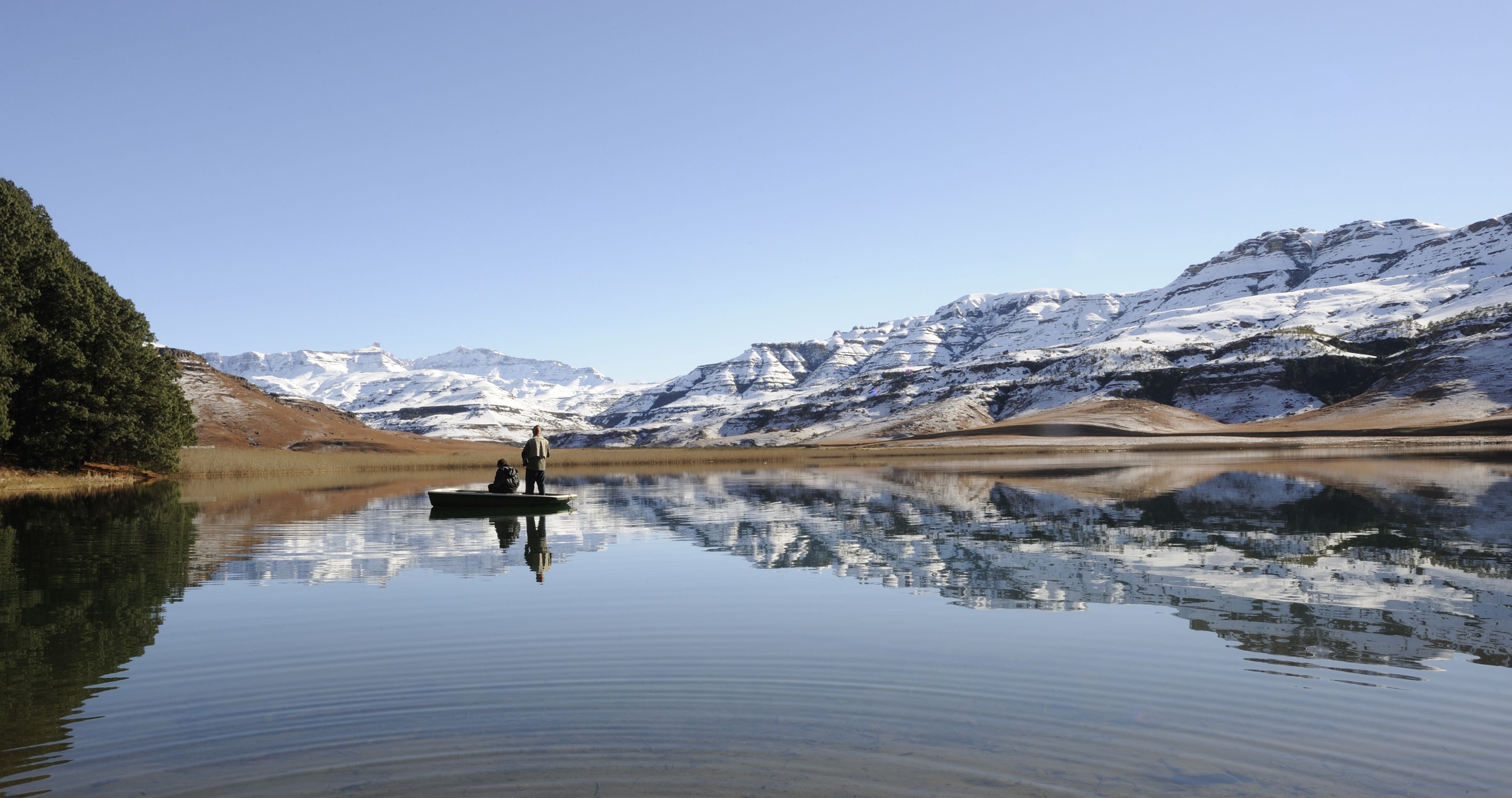 Enchanting-Travels-Africa-South-Africa-10 flyfishing for trout against a backdrop of snow at giants cup wilderness reserve, kwazulu natal, south africa - history of South Africa