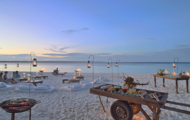 Romantic dinner at the beach at hotel Mnemba Island Lodge, Zanzibar, Tanzania - Perfect for Winter travel