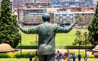 A large statue of former South African president Nelson Mandela stands 9 meters tall in the middle of the Union Buildings in Pretoria.