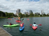 group of young people kayaking on the West Reservoir