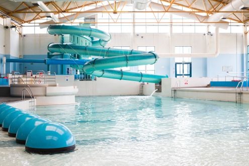 Empty leisure pool with flume