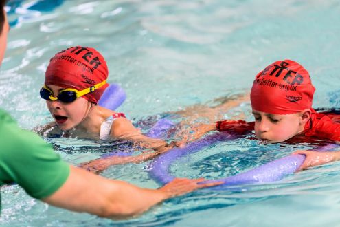 Two children having a SEND swimming lesson at Southbury Leisure Centre