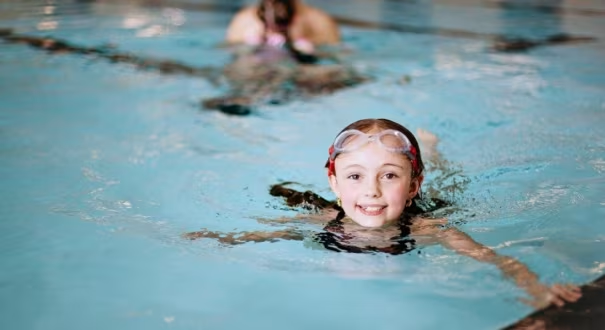 Girl swimming in pool