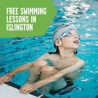 image shows a boy in a silver swim hat crouched against the wall ready to swim on his back.