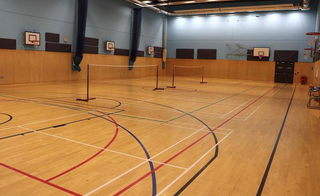 Sports hall set up for badminton