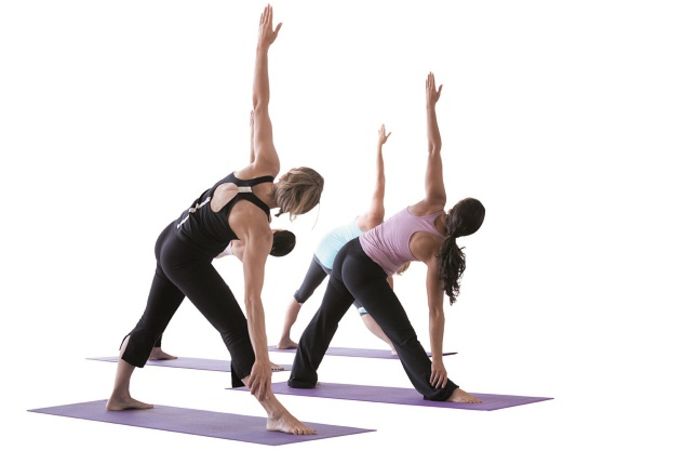 women stretching in yoga